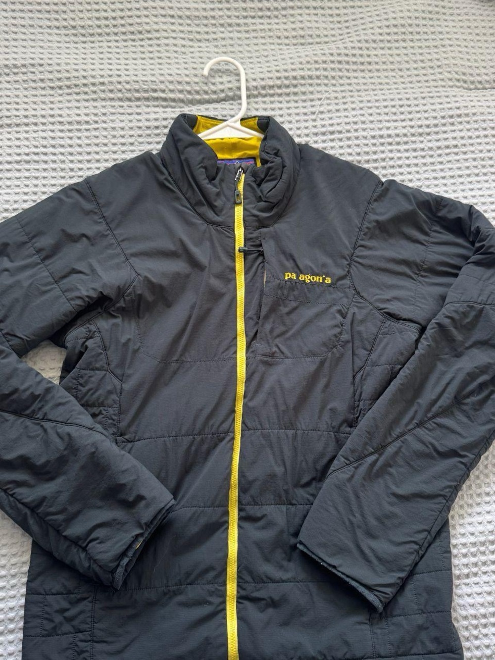 Patagonia Men's Black Jacket with Yellow Trim